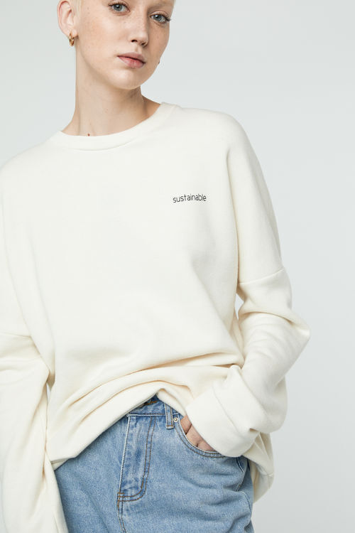 cream crewneck sweatshirt